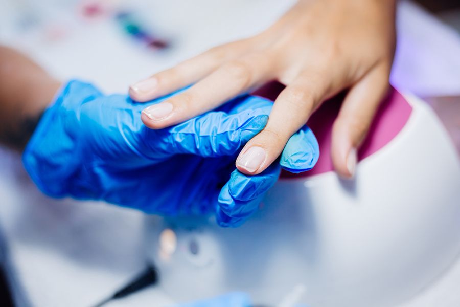 Woman recieving a lip Hydration Booster injection