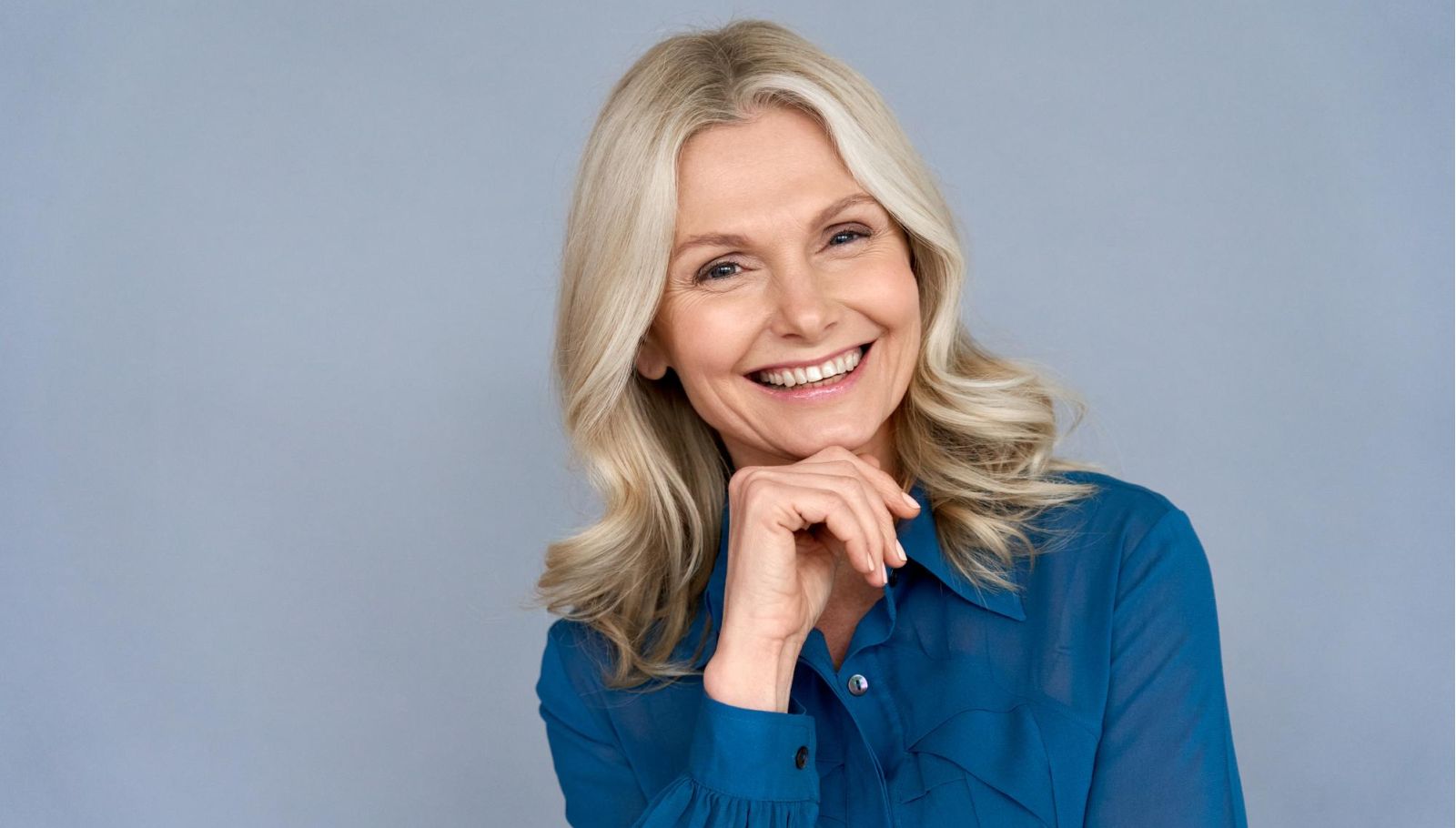 mature woman with grey hair  smiling